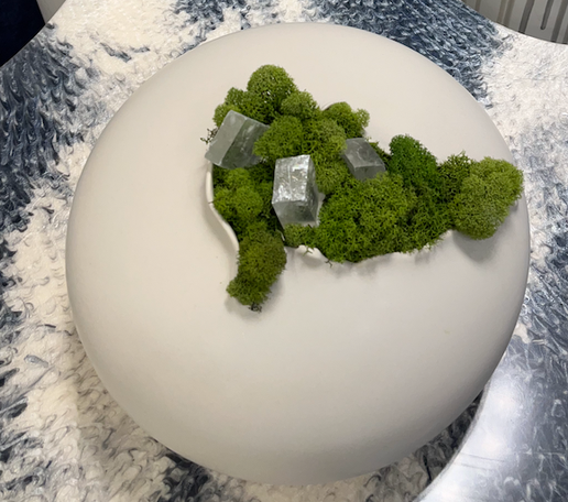 Floral Arrangement in White Globe